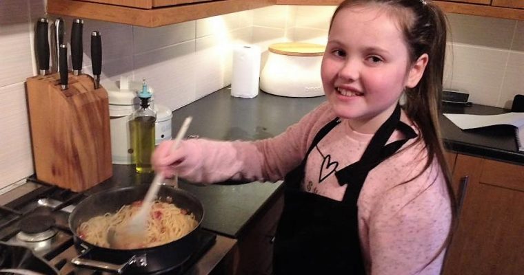 Young Client Cooking her Carbonara